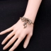 Phong cách châu Âu và Mỹ nhà máy trang sức thời trang trực tiếp cổ điển retro kim cương cung mặt dây chuyền phụ nữ vòng đeo tay vòng đá thạch anh Vòng đeo tay Cuff