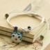 Handmade sáng tạo đồ trang sức nhỏ Jingdezhen gốm sứ dễ thương mèo vòng tay người yêu đồ trang sức unisex bện dây điều chỉnh vòng thạch anh tóc vàng Vòng đeo tay Clasp