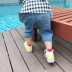 Quần jean bé trai 2019 mùa hè mới nam và nữ baby hoang dã cắt quần quần trẻ em cao bồi nước ngoài - Quần jean Quần jean