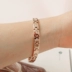 Vòng tay bảo vệ sức khỏe KOTO chính hãng Đài Loan Vòng đeo tay sức khỏe vòng tay sức khỏe titan germanium từ tính hoa hồng vàng mẫu nữ