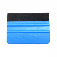 Синий скребок с пухом