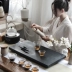 Khay trà đá vàng đen Kung Fu Bộ trà Bộ bàn trà nhỏ gia đình Nhật Bản trà đơn giản biển trà đạo hoàn toàn tự động một
