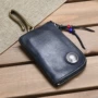 Châu Âu và Hoa Kỳ retro da đen sáng tạo handmade da xe chìa khóa túi điều khiển từ xa vị trí thẻ thay đổi unisex ví móc khóa coach