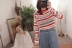 Cô gái Hàn Quốc retro màu sắc tương phản sọc ánh sáng mờ lỏng dài tay áo len kem chống nắng quần áo A 2123