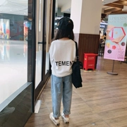 Quần áo trẻ em MIKA 2019 mùa thu mới phiên bản Hàn Quốc của các chàng trai và cô gái lớn đằng sau bức thư in áo thun dài tay chạm đáy - Áo thun