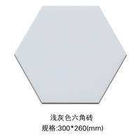 Светло -серый шестиугольный кирпич