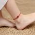 Hoàn toàn trang sức đỏ năm nay vòng chân nữ đỏ mã não an toàn chuyển hạt điều chỉnh góc phụ kiện đơn giản vòng chân cho nữ Vòng chân