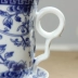 Bộ trà gốm sứ màu xanh và trắng bốn mảnh cốc cốc lọc nước cá nhân cup với nắp lọc họp văn phòng tea cup