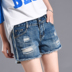 Burr thêu hoa lỗ quần short denim nữ mùa hè 2018 mới trung eo sinh viên hoang dã lỏng quần nóng triều thời trang quần giả váy Quần jean