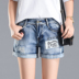 Burr thêu hoa lỗ quần short denim nữ mùa hè 2018 mới trung eo sinh viên hoang dã lỏng quần nóng triều thời trang quần giả váy Quần jean