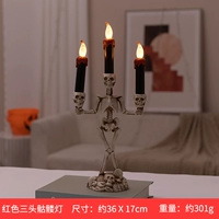 Три красных свечи черепа