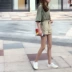 2018 mùa hè mới Hàn Quốc phiên bản của đơn giản màu rắn hoang dã cao eo retro curling quần short denim thẳng quần chân rộng phụ nữ thoi trang cong so Quần jean
