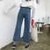 2018 mới của Hàn Quốc phiên bản của retro cũ đa túi cao eo rách cạnh jeans loose hoang dã chín điểm quần chân rộng phụ nữ Quần jean