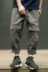 Macheda mùa hè Nhật Bản thanh niên retro quần âu xu hướng tám quần lỏng overalls nam quần cắt thấp Quần làm việc