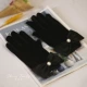 Черные перчатки из жемчуга с бантиком