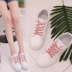 Mùa hè mới của Hàn Quốc phiên bản chụp đường phố giày trắng nữ lớn phía đông với đoạn giày vải hoang dã