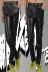 Quần da nam mỏng chân quần Hàn Quốc phiên bản của triều thanh niên xe gắn máy khâu PU da đầu máy hộp đêm chặt chẽ mùa thu và mùa đông quần âu quần da nam đen bóng Quần da