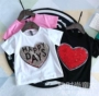 Quần áo trẻ em 18 mùa hè cô gái mới Hàn Quốc phiên bản của mô hình vụ nổ thời trang tình yêu sequins hai mặt mô hình ngắn tay T-Shirt áo thun trẻ em